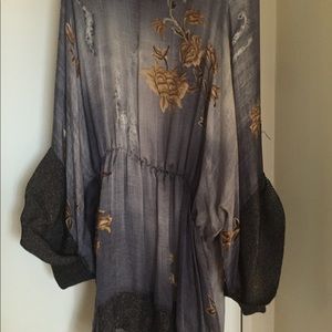 Roberto Cavalli silk blouse with loose turtleneck